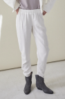 Białe lekkie spodnie Loose wełna 100% na modelce